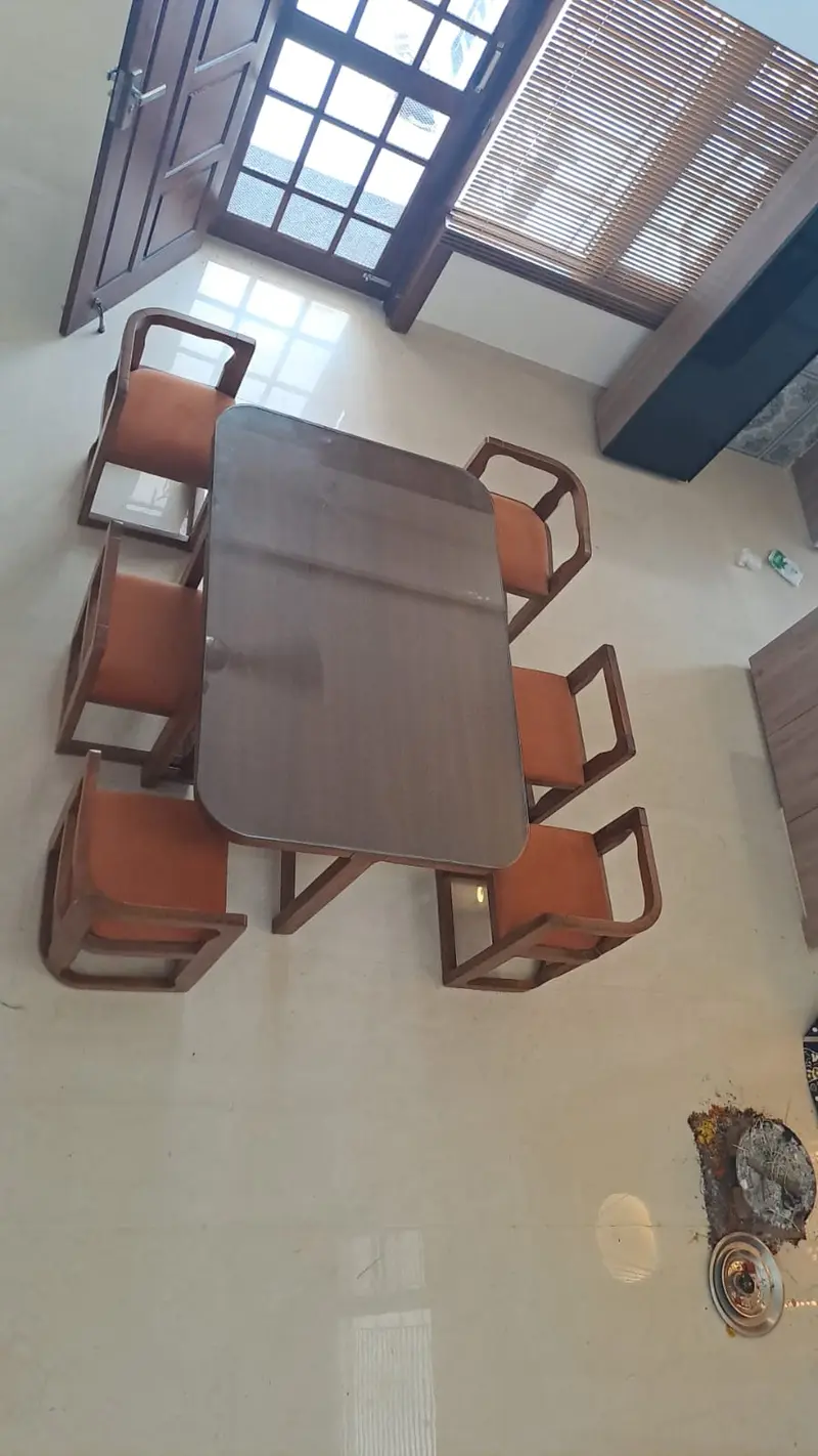 Wooden Dining Table With Orange Chairs